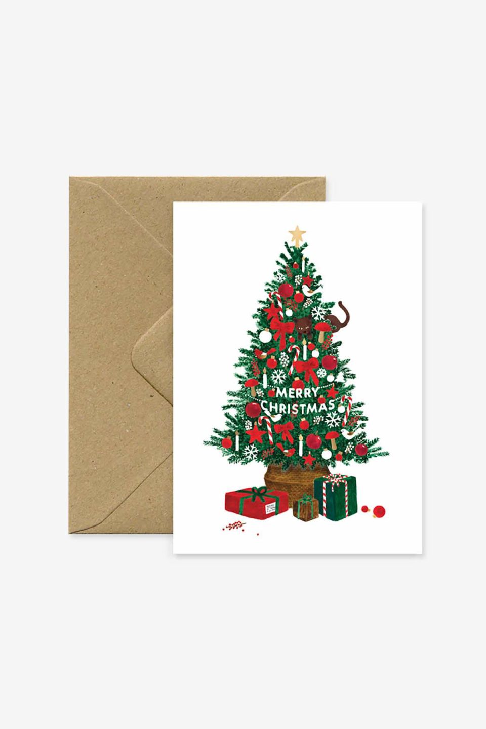 Božična čestitka s motivom okićenog božićnog drvca s poklonima i natpisom merry christmas, iz se vidi smeđa kuverta