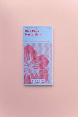 Plava kutija sjemenki Nasturtium Blue Pepe na rozoj podlozi